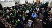 عطرافشانی حرم مطهر امام هشتم با حضور خانواده شهدای میناب